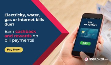 Man using smartphone to file power complaint via Bijli Samadhan app in Jhunjhunu