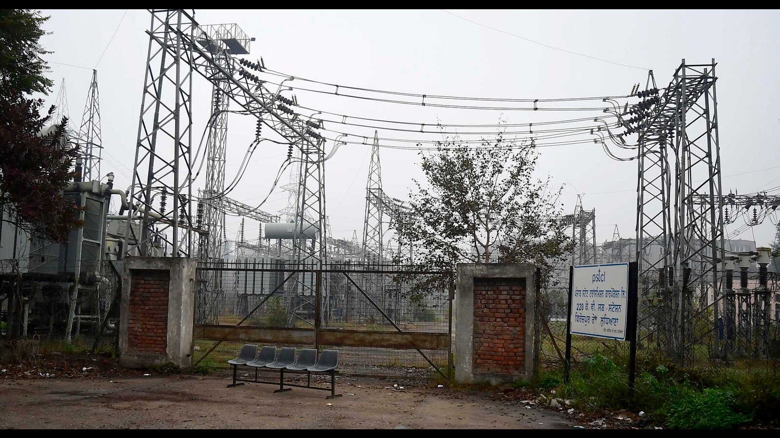 Electrician working on transformer equipment during planned maintenance in Jhunjhunu