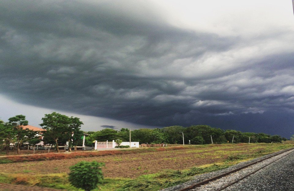 Dark clouds over Jhunjhunu with people preparing for monsoon rains in July 2025
